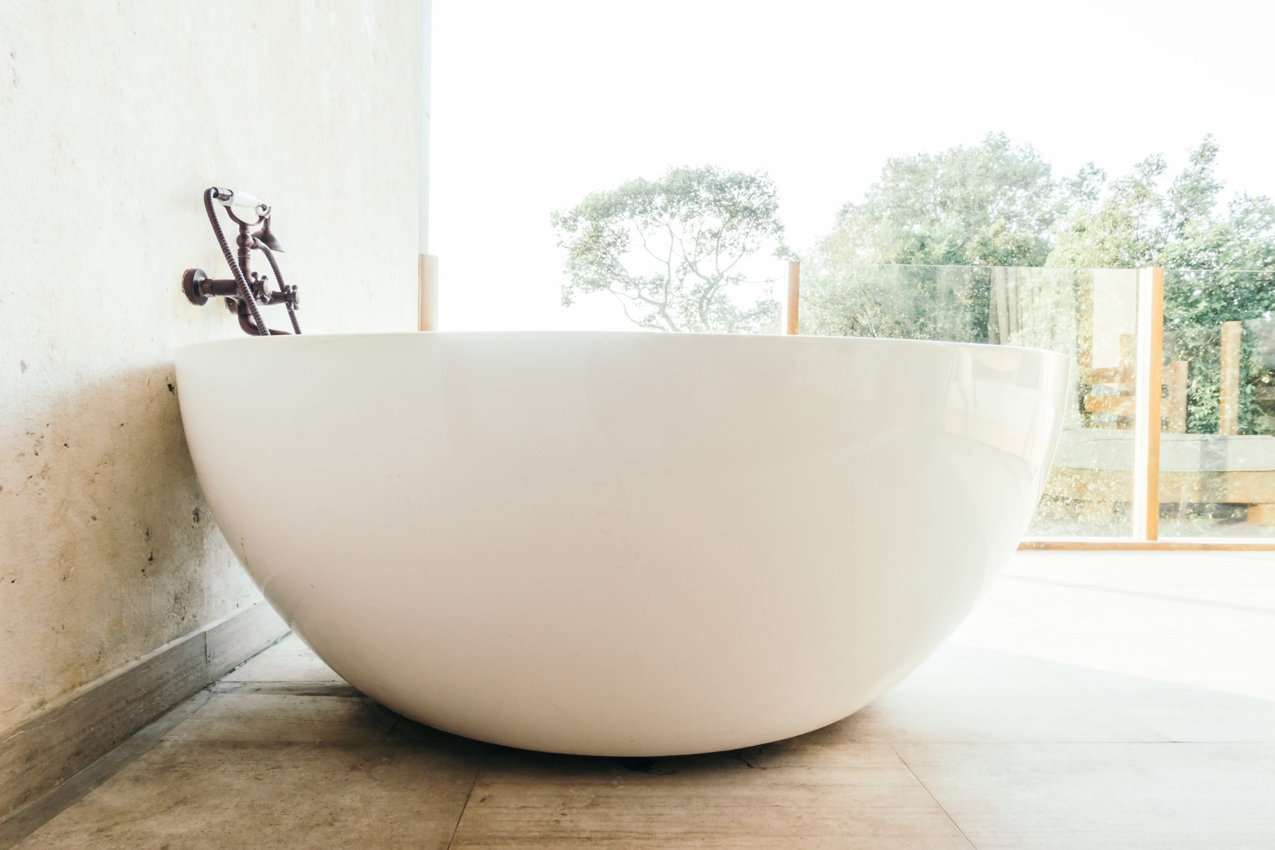 Beautiful luxury Bathtub decoration in bathroom interior - Vintage light Filter